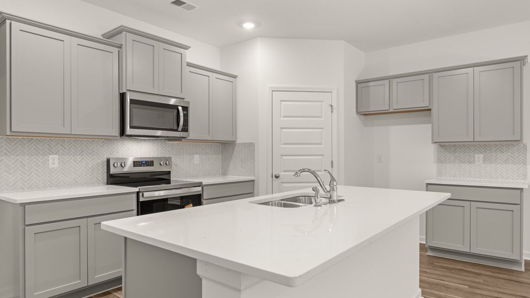 Representative furnished interior of a home built from the Cali by D.R. Horton in The Reserve at Calcutta, Stockbridge (Image 4).