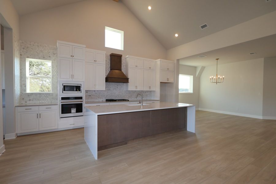 Furnished interior view inside a new home in Wolf Ranch – West Bend, Georgetown (Image 5).