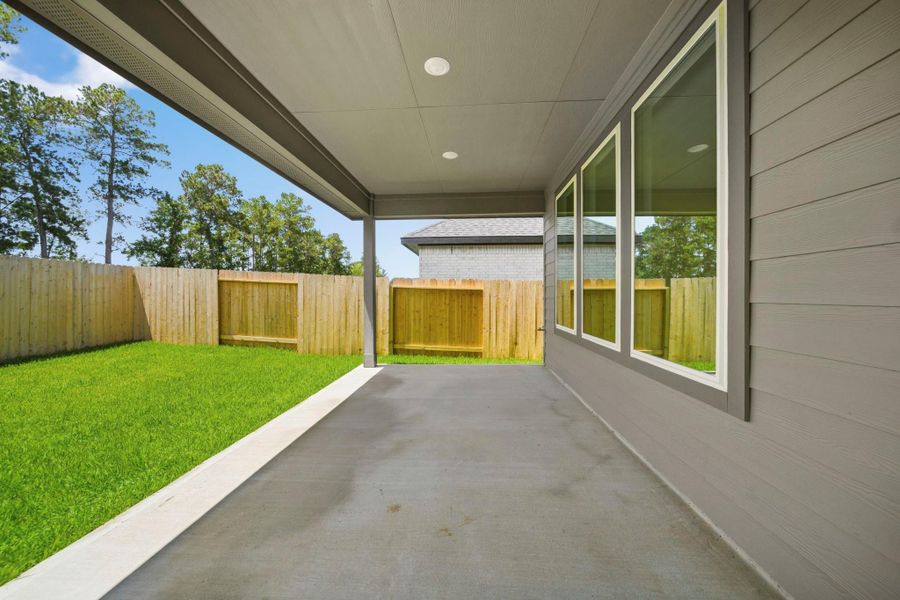 Exterior details and patio area of a home in Mill Creek Estates, Magnolia (Image 18).