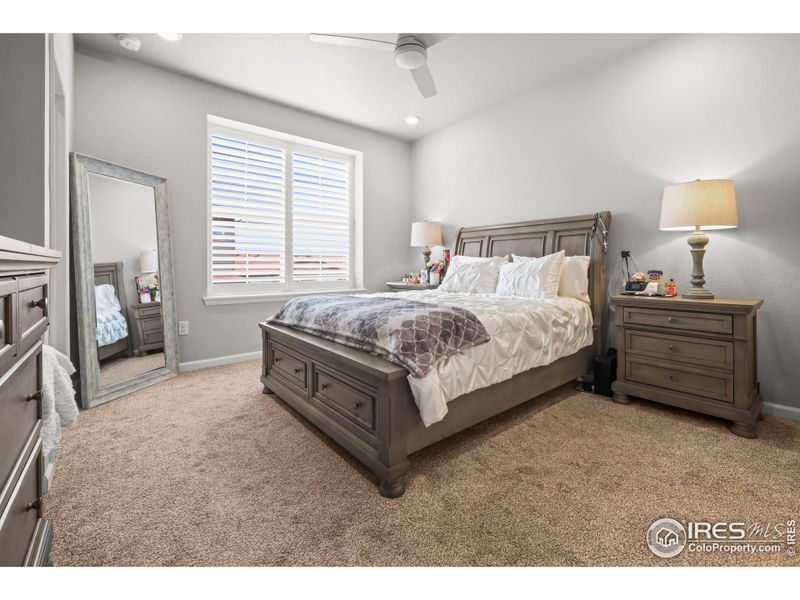 Primary bedroom. Tall ceilings and large rooms make the townhome feel expansive. Primary bedroom. Tall ceilings and large rooms make the townhome feel expansive.