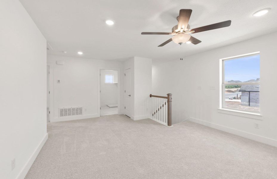 Spacious, unfurnished interior of a new home in Saddleback at Santa Rita Ranch, Liberty Hill (Image 15).