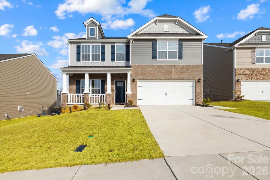 Front exterior of a new home in Adair Woods, Davidson, NC, highlighting curb appeal (Image 31). Front exterior of a new home in Adair Woods, Davidson, NC, highlighting curb appeal (Image 31).