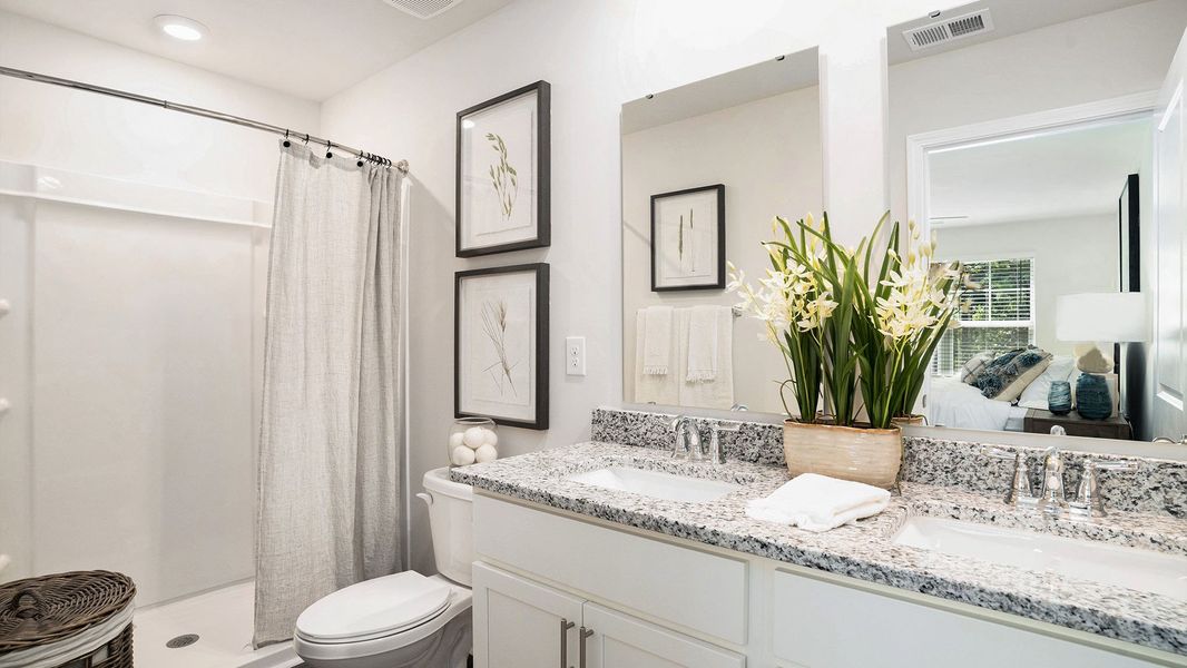 Furnished interior in a model home at The Townes at Amber Bluff in Conway (Image 12).