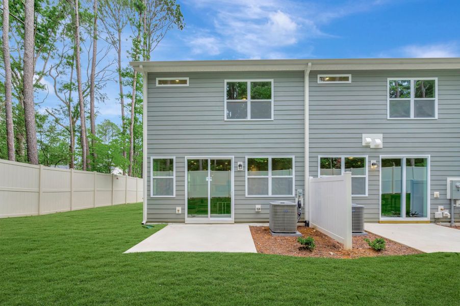 Exterior details and patio area of a home in Ashmore Townes, Garner (Image 4). Exterior details and patio area of a home in Ashmore Townes, Garner (Image 4).