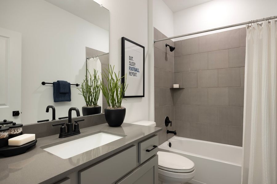 Representative furnished interior of a home built from the 4054 by Risewell Homes in Parkton Square, Kyle (Image 18).