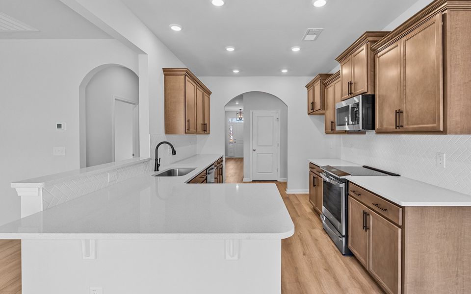Furnished interior view inside a new home in Fieldstone, Lexington (Image 7).