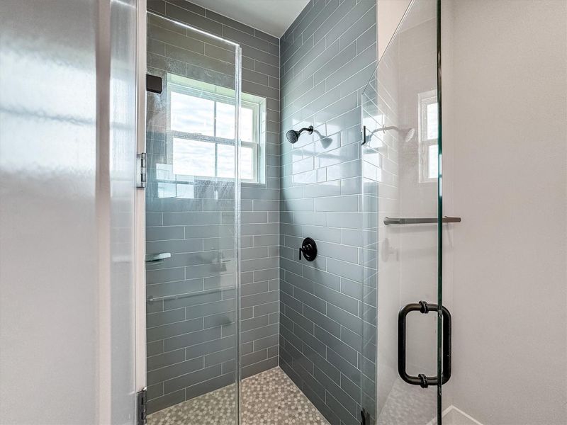 Custom tile walk-in shower.