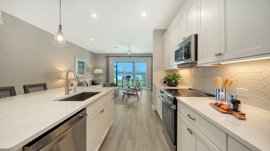 Representative furnished interior of a home built from the Avery by Neal Communities in SkySail, Naples (Image 13).