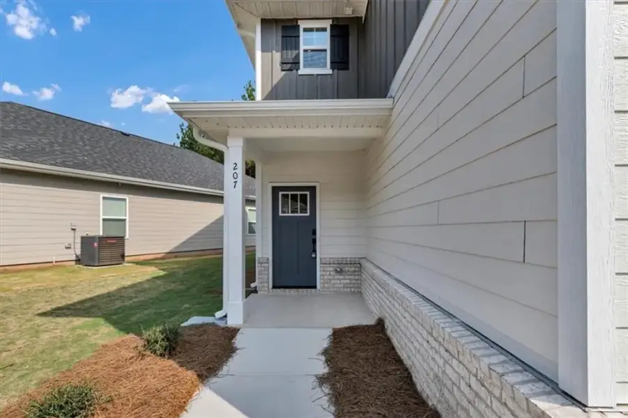 Exterior details and patio area of a home in Canterbury Villas, Carrollton (Image 3).