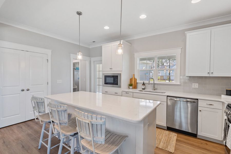 Representative furnished interior of a home built from the Grantville by Bill Clark Homes in The Sanctuary at Sunset Beach, Sunset Beach (Image 14).