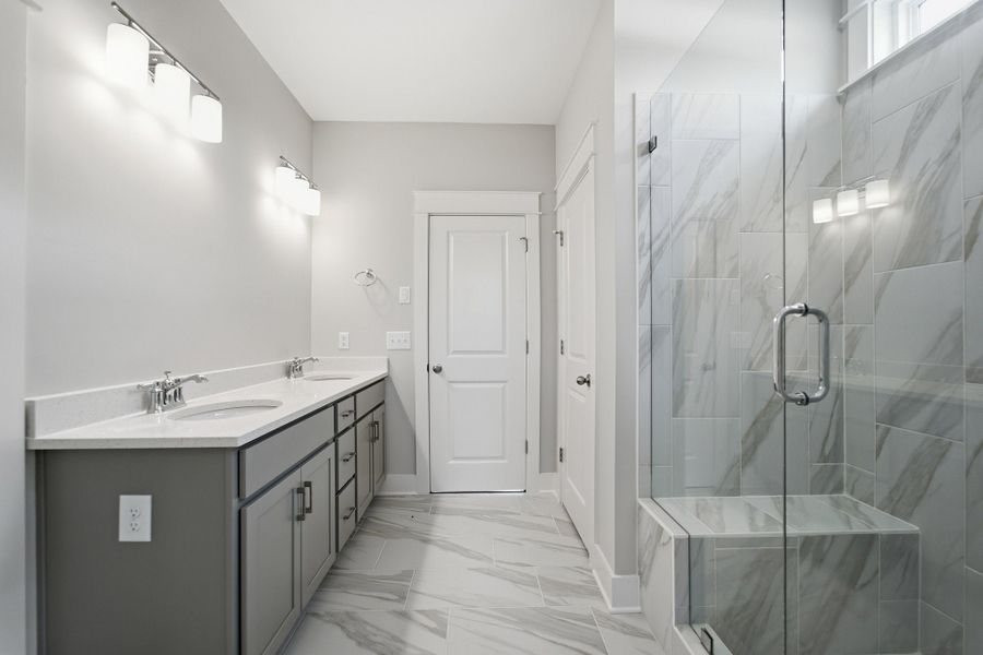 Furnished interior view inside a new home in Aden Woods, Fairview (Image 11).
