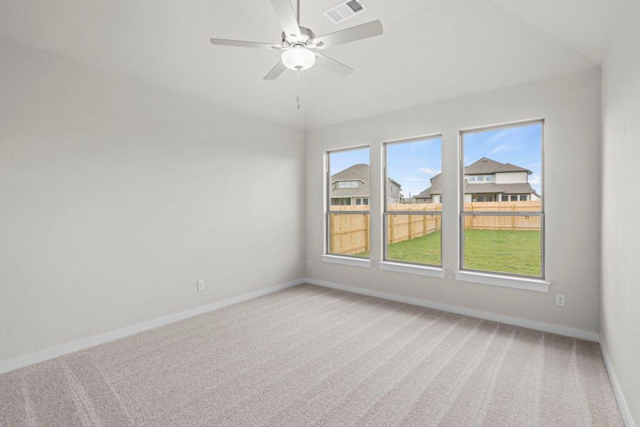 Primary Bedroom with elevated ceiling