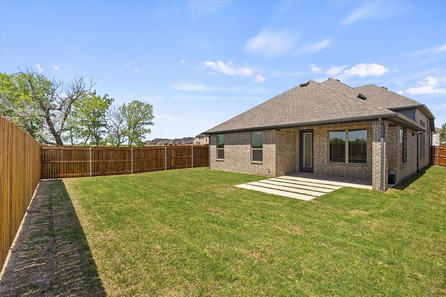 Exterior details and patio area of a home in , Fate (Image 4).