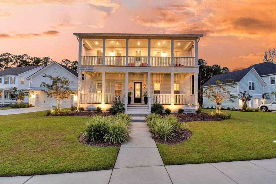 Front exterior of a new home in Carolina Park: Riverside, Mount Pleasant, SC, highlighting curb appeal (Image 26). Front exterior of a new home in Carolina Park: Riverside, Mount Pleasant, SC, highlighting curb appeal (Image 26).