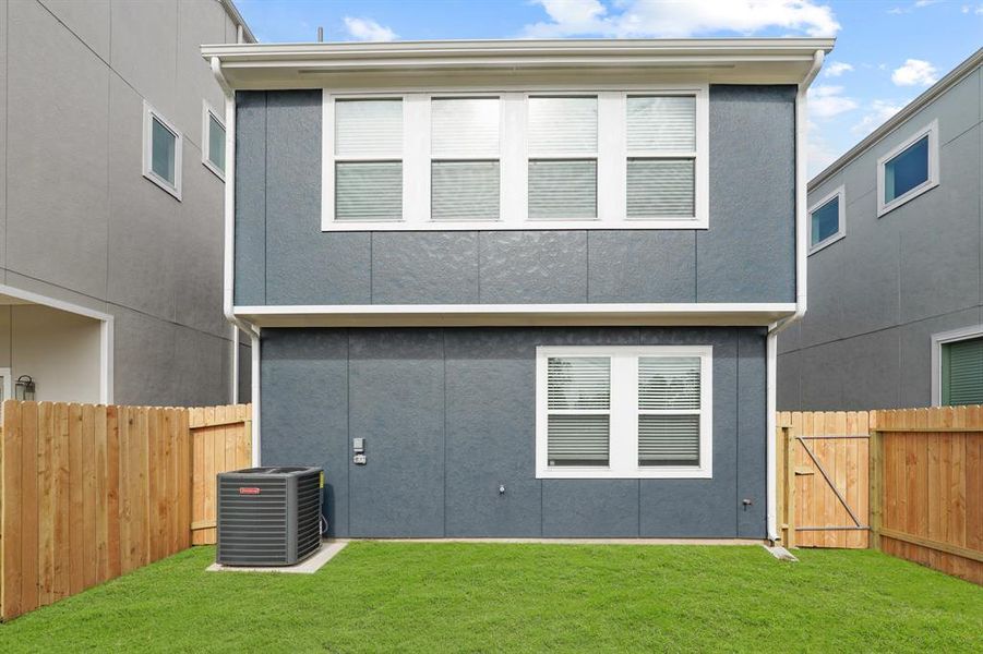 Lower maintance yard with back fence for privacy (*Photo not of actual home and used for illustration purposes only.)