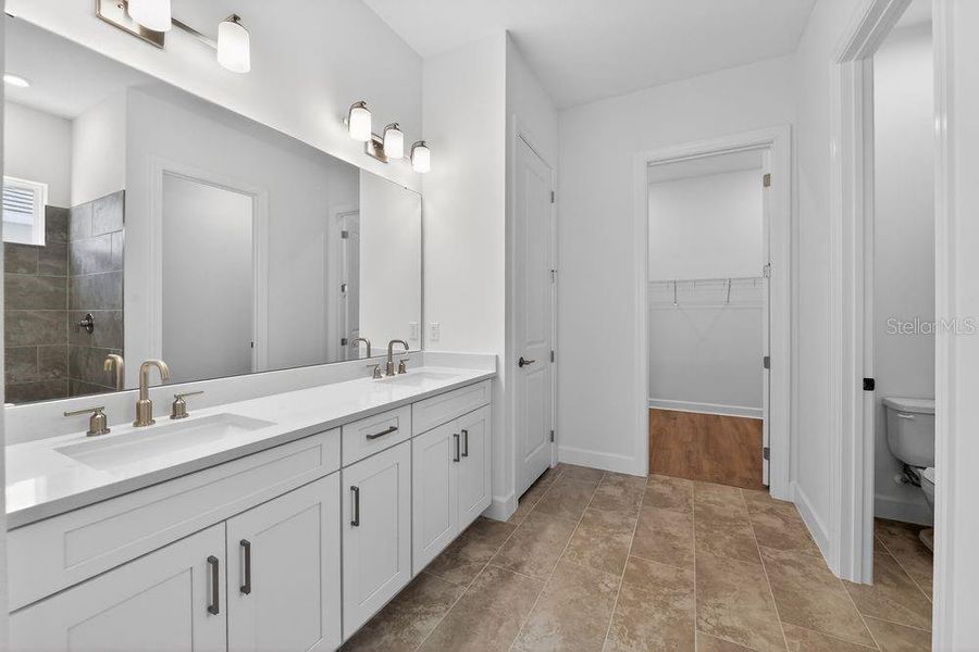 Furnished interior view inside a new home in Coasterra Community Group Page, Palmetto (Image 9).