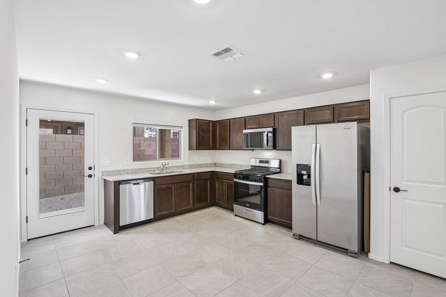 Furnished interior view inside a new home in The Landings at Rancho Del Lago, Vail (Image 3).