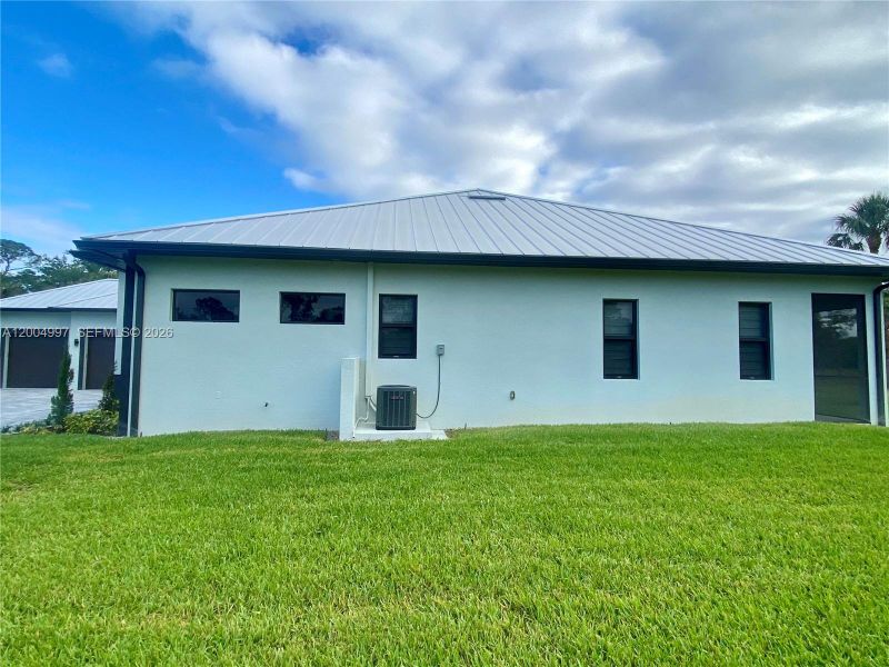Exterior details and patio area of a home in , Naples (Image 23).