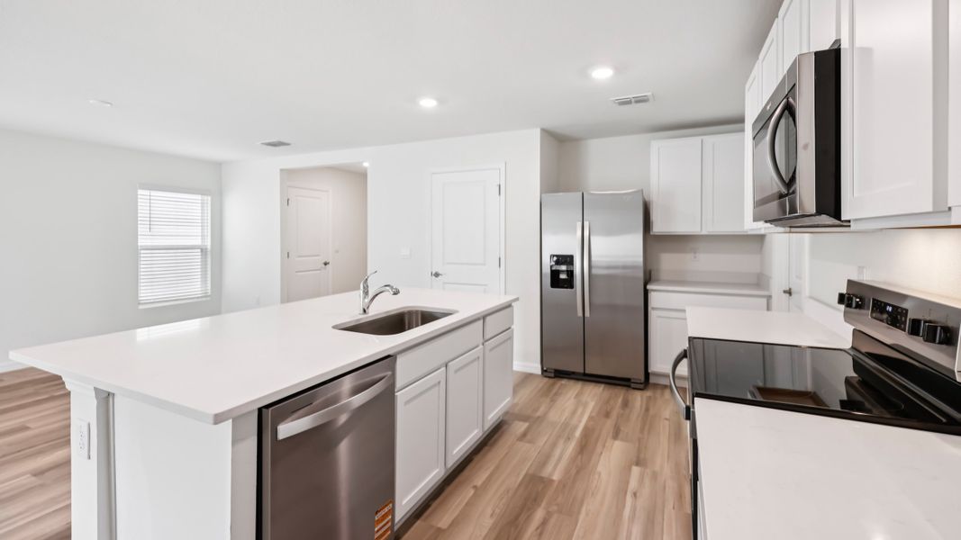 Representative furnished interior of a home built from the ROBIE by D.R. Horton in Oaks Preserve, Gainesville (Image 24).