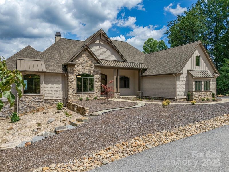 Front exterior of a new home in , Zirconia, NC, highlighting curb appeal (Image 2). Front exterior of a new home in , Zirconia, NC, highlighting curb appeal (Image 2).