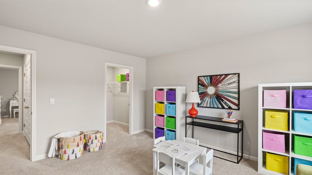Representative furnished interior of a home built from the Mansfield by D.R. Horton in Estates at Deer Hollow, Grovetown (Image 31).