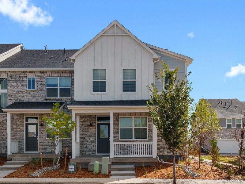 Front exterior of a new home in Horizon Uptown: The Meadow Collection, Aurora, CO, highlighting curb appeal (Image 21). Front exterior of a new home in Horizon Uptown: The Meadow Collection, Aurora, CO, highlighting curb appeal (Image 21).