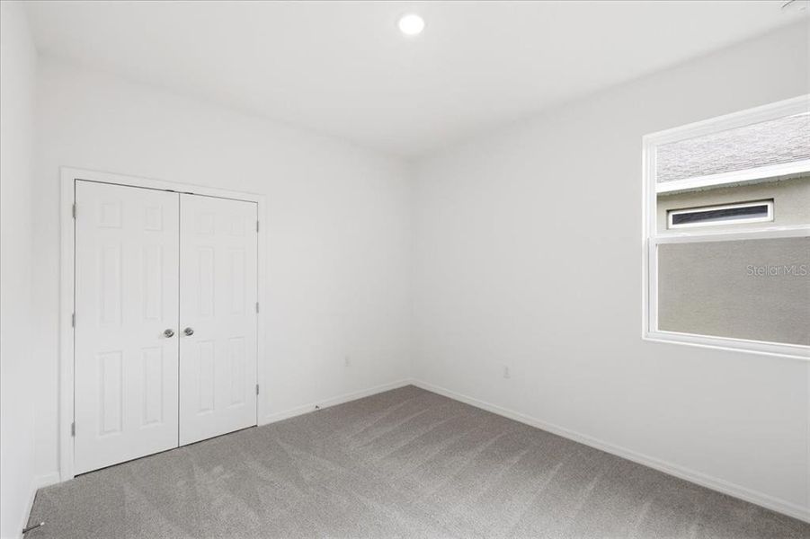 Spacious, unfurnished interior of a new home in Highfield at Twisted Oaks, Wildwood (Image 10).