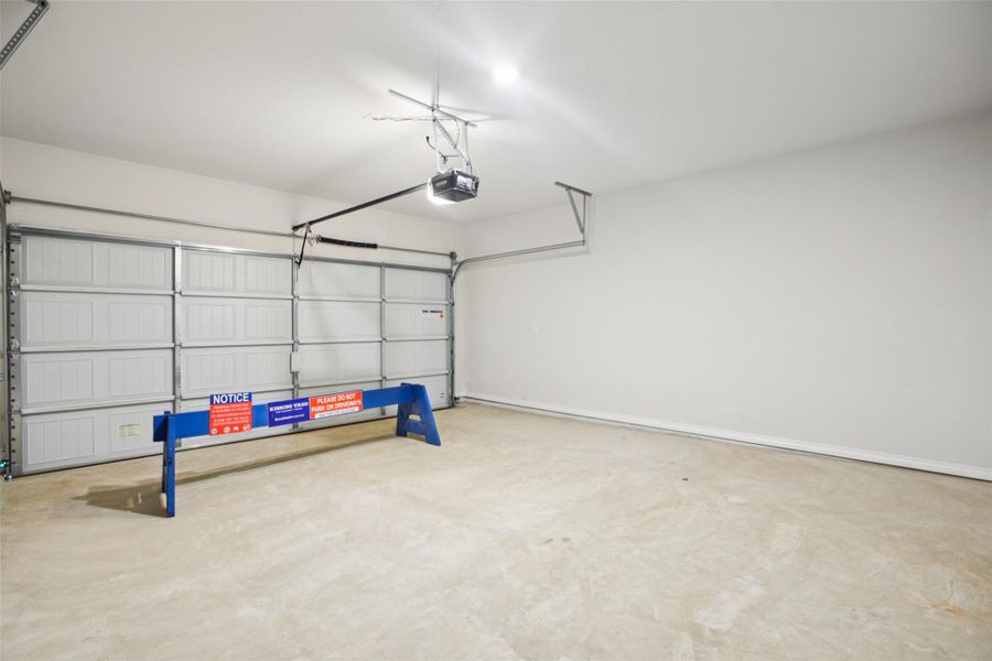 Garage with a garage door opener Garage with a garage door opener