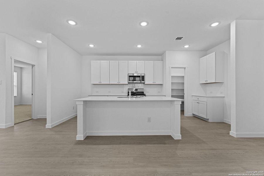 Furnished interior view inside a new home in Waterwheel: Coastline Collection, San Antonio (Image 7).