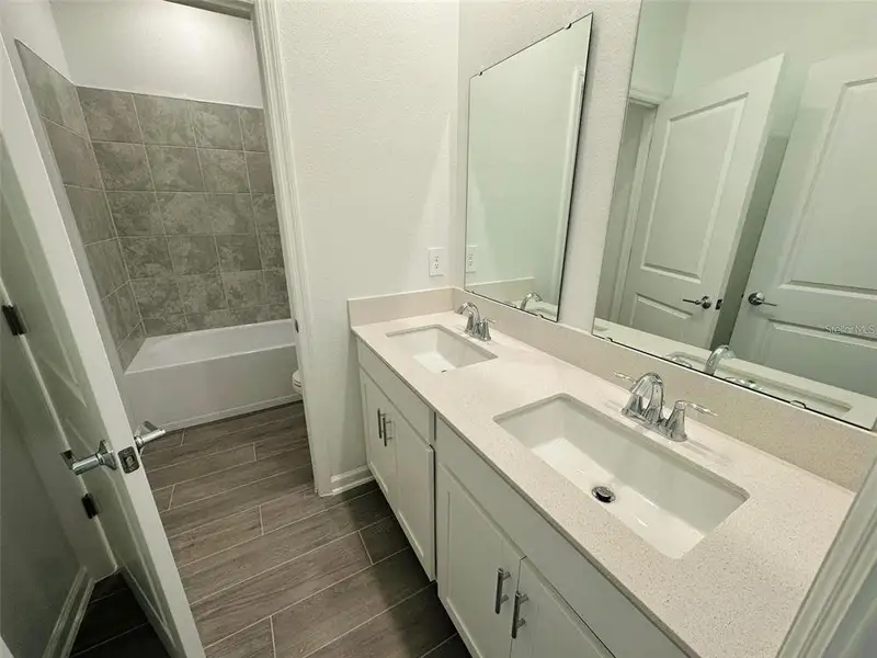 Furnished interior view inside a new home in Wellness Ridge: Estates Collection, Clermont (Image 6).