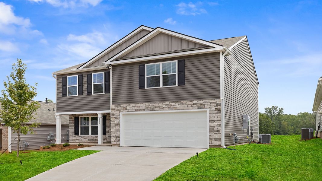Front exterior of a new home in Lakestone, Woodruff, SC, highlighting curb appeal (Image 2).