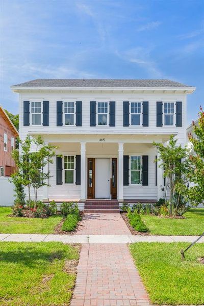 Front exterior of a new home in , St. Petersburg, FL, highlighting curb appeal (Image 5).