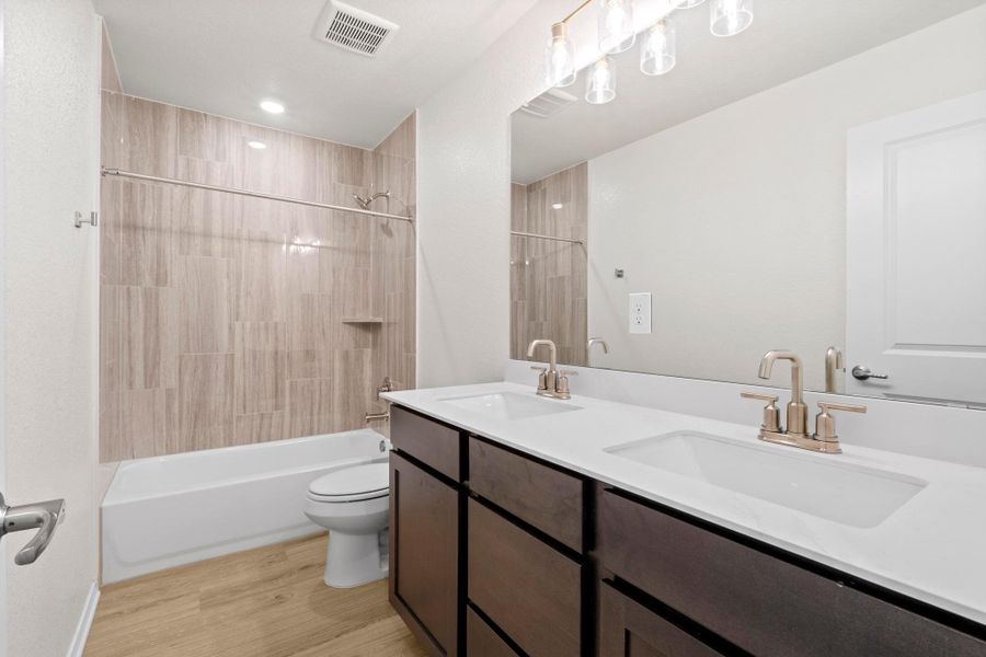 Furnished interior view inside a new home in Salerno - Classic Collection, Round Rock (Image 6). Furnished interior view inside a new home in Salerno - Classic Collection, Round Rock (Image 6).