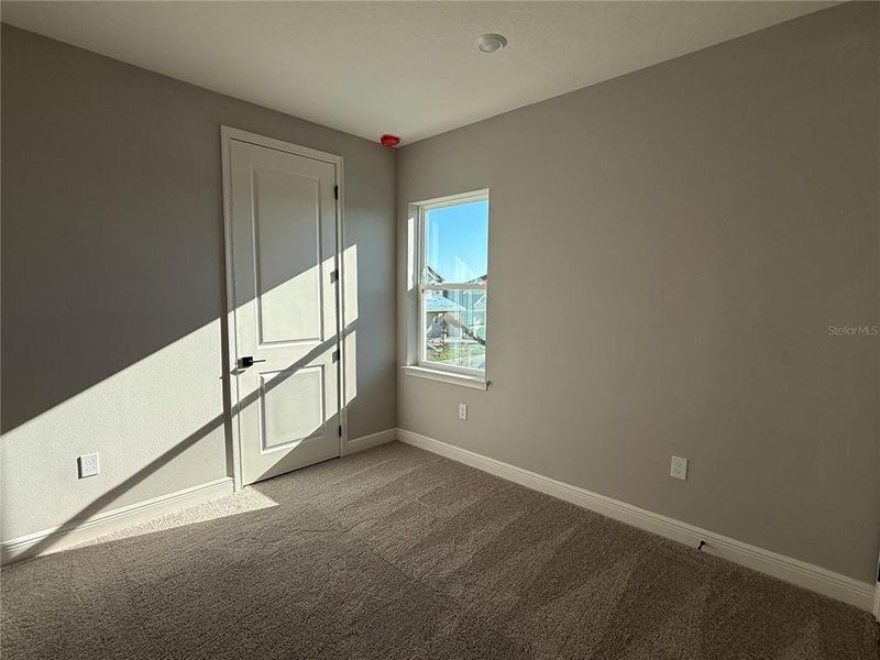 Spacious, unfurnished interior of a new home in Laureate Park, Orlando (Image 21).