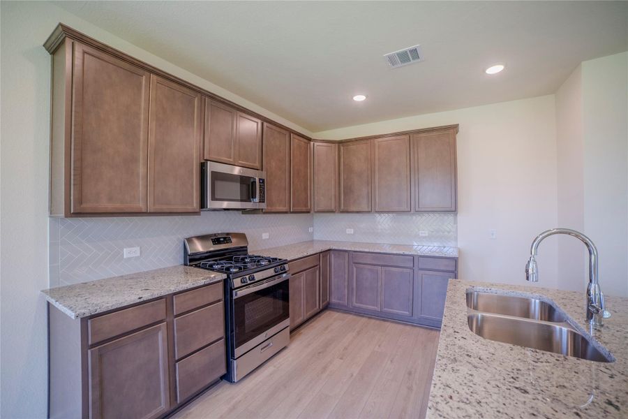 Furnished interior view inside a new home in , Brenham (Image 9).