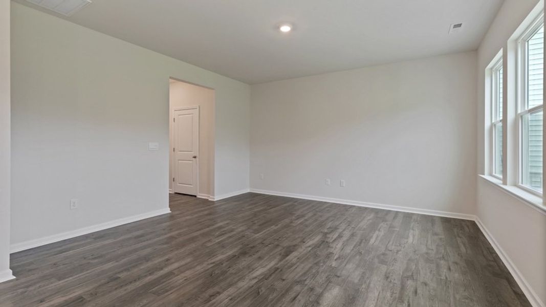 Spacious, unfurnished interior of a new home in The Grove at Matthews Landing, Fuquay Varina (Image 14).