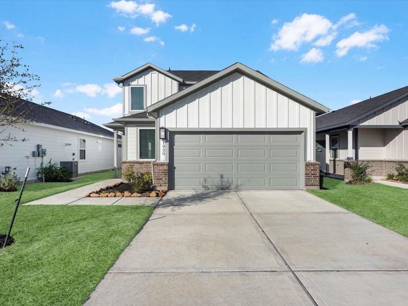 Two car garage with plenty of parking in the driveway Two car garage with plenty of parking in the driveway