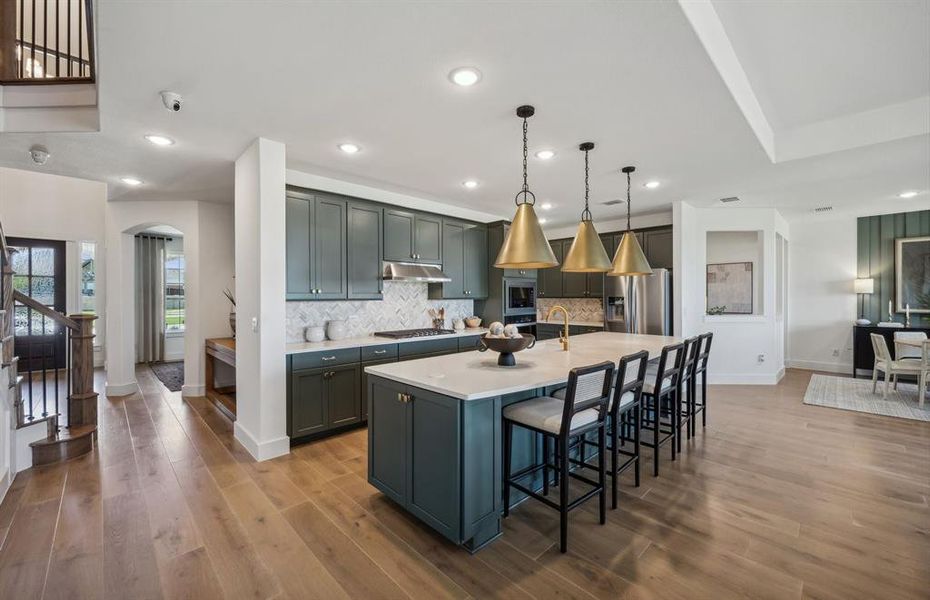 *Actual home, furniture not included - Large island overlooking gathering room and dining areas *Actual home, furniture not included - Large island overlooking gathering room and dining areas