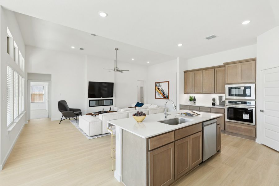 Kitchen in the Gilmour II home plan by Trophy Signature Homes – REPRESENTATIVE PHOTO