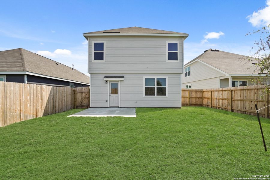 Front exterior of a new home in Dauer Ranch, New Braunfels, TX, highlighting curb appeal (Image 16). Front exterior of a new home in Dauer Ranch, New Braunfels, TX, highlighting curb appeal (Image 16).