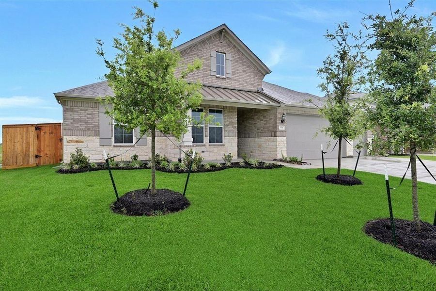 Front exterior of a new home in Lago Mar, Texas City, TX, highlighting curb appeal (Image 23).
