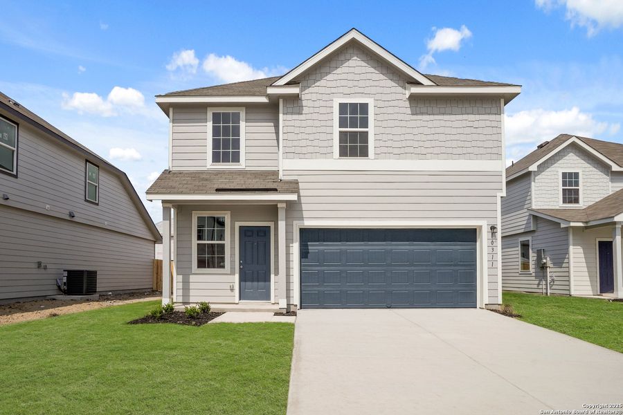 Front exterior of a new home in Applewhite Meadows, San Antonio, TX, highlighting curb appeal (Image 2). Front exterior of a new home in Applewhite Meadows, San Antonio, TX, highlighting curb appeal (Image 2).