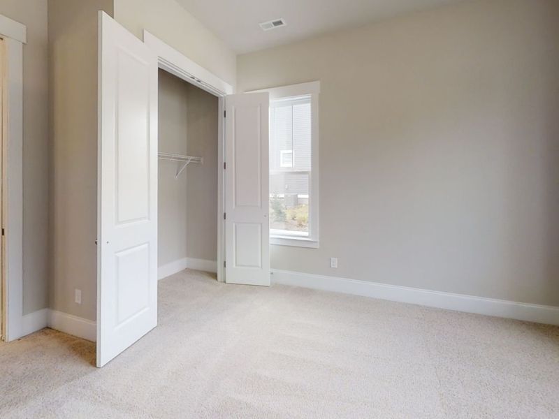 Representative unfurnished interior of a home built from the The Riposo by Avencia Homes in Riverwalk, Rock Hill (Image 14).