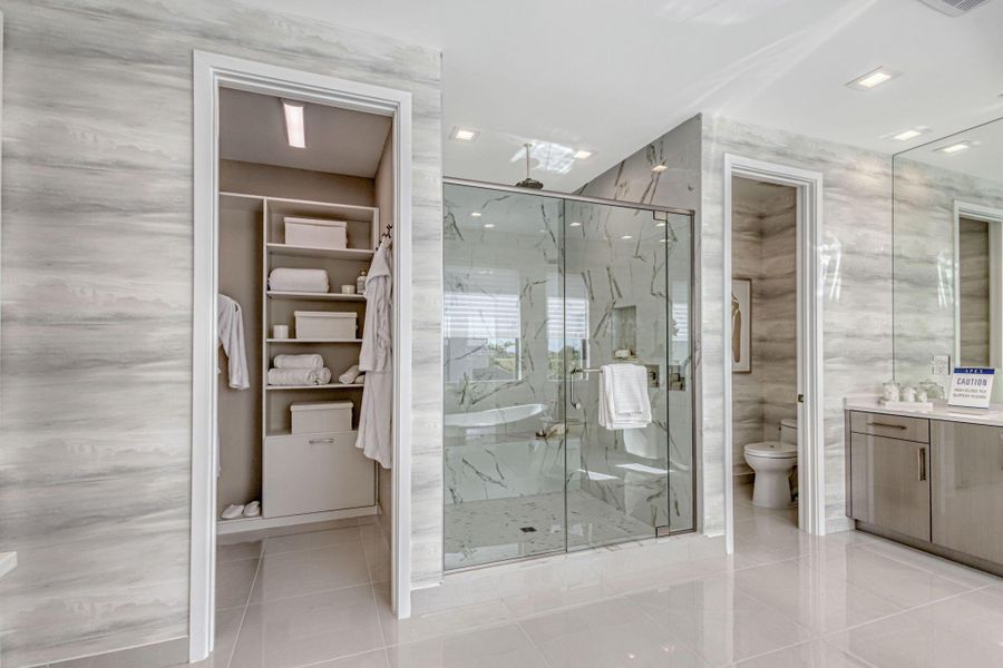 Furnished interior view inside a new home in Apex at Avenir, Palm Beach Gardens (Image 50).