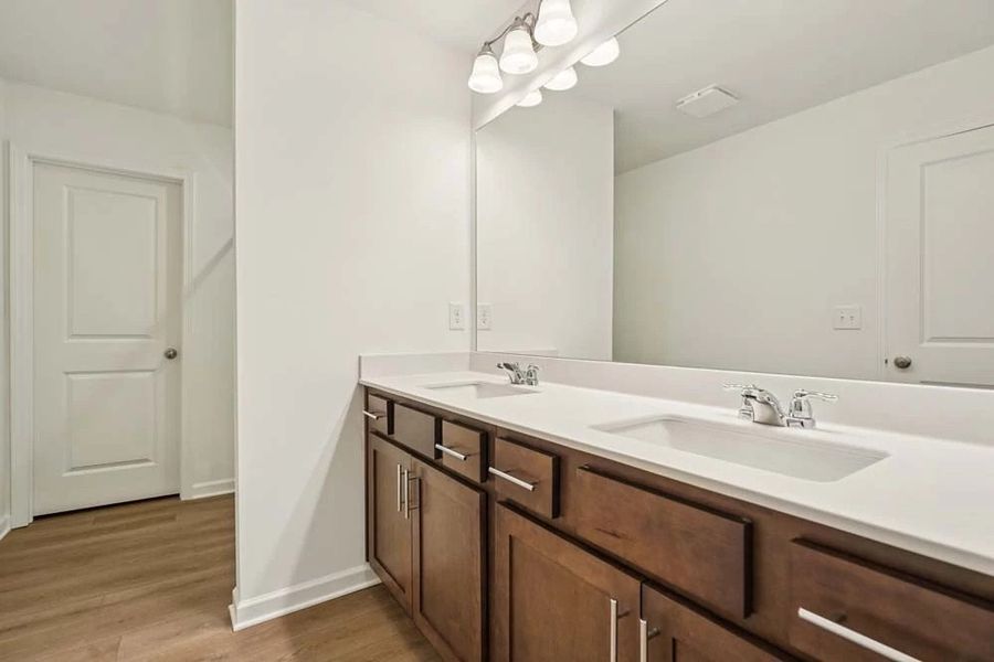 Sample Photo: Primary Bathroom featuring Roosevelt Collection Finishes Sample Photo: Primary Bathroom featuring Roosevelt Collection Finishes
