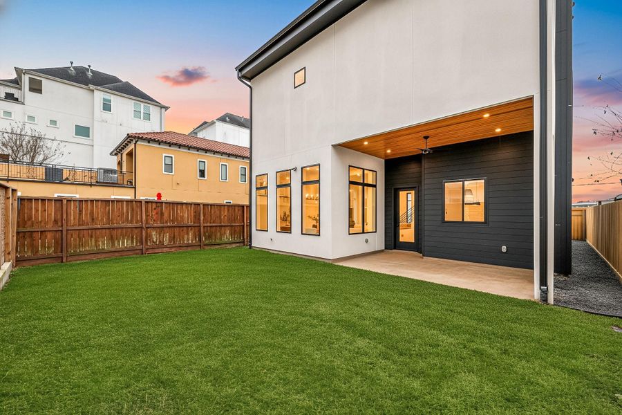 Backyard green space — a valuable feature rarely found in modern urban builds.