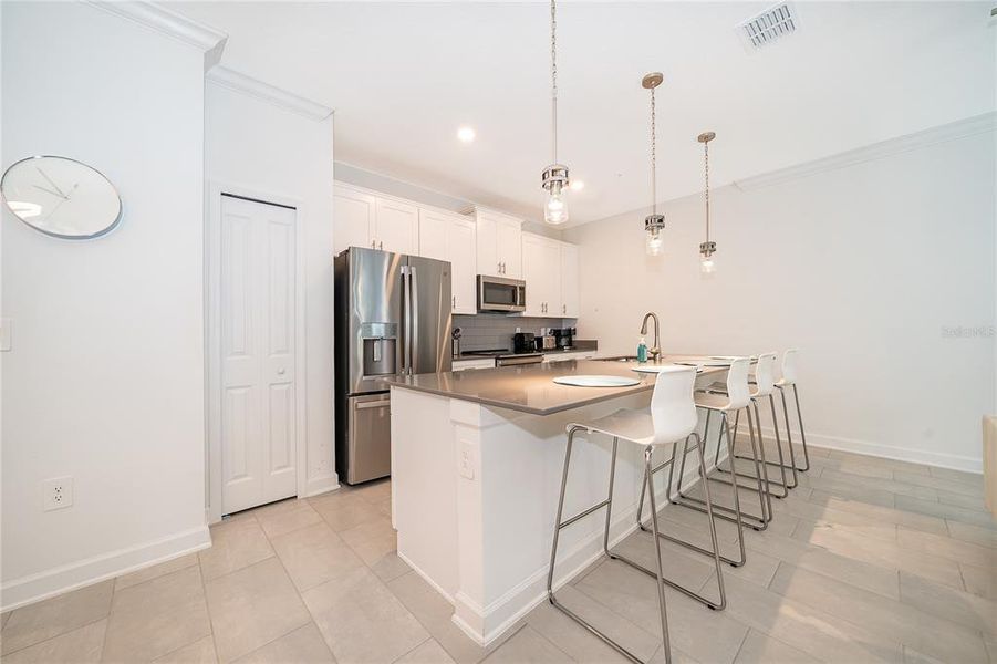 Furnished interior view inside a new home in , Kissimmee (Image 17).