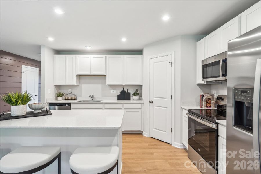 Example Photo Example Photo