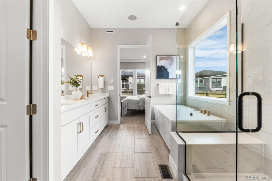 Furnished interior view inside a new home in Hilltop at Inspiration, Aurora (Image 31).