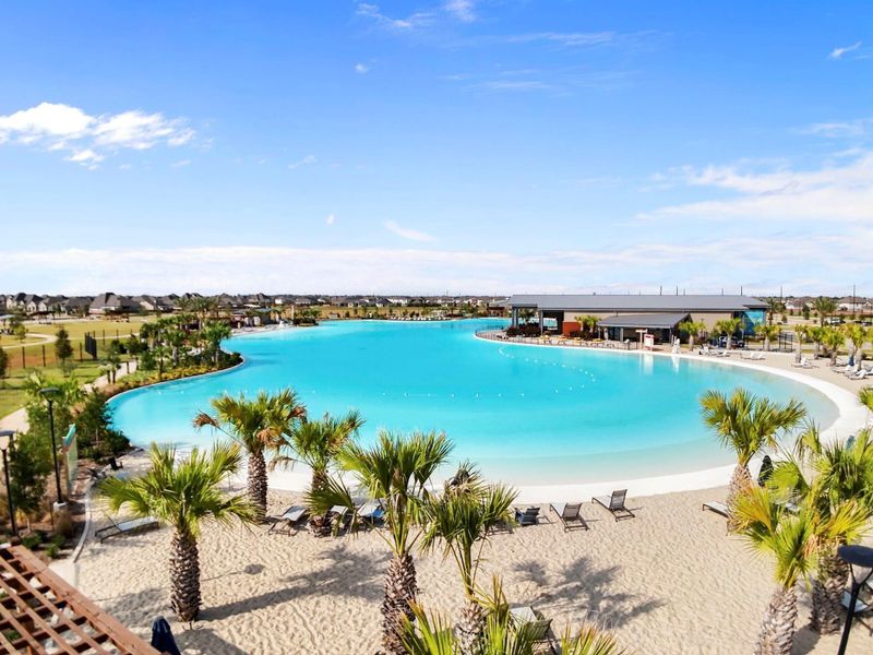 The star feature of The Sol Club is a Crystal Lagoons® amenity where people can walk along white-sand beaches, swim, kayak and paddleboard on turquoise blue waters — it’s a tropical vacation that can be yours when you live in Sunterra! Surrounding the lagoon is The Sol Club amenity village and more just a bike away!